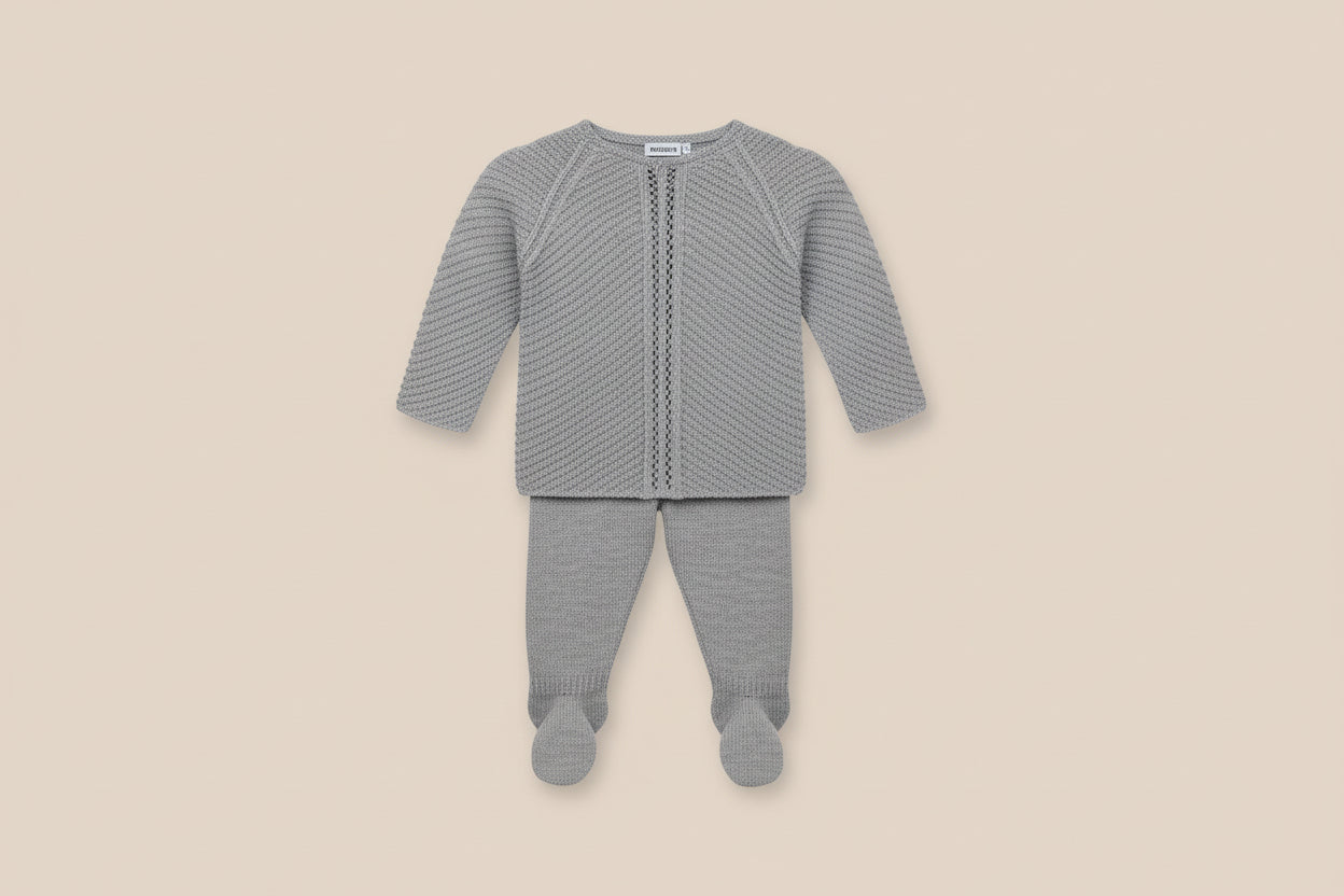 Baby two-piece outfit includes seamless knitted sweater with leggings