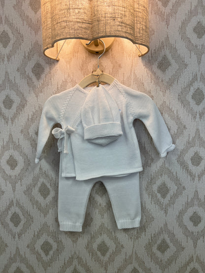 Baby three-piece outfit includes knitted sweater, leggings and hat