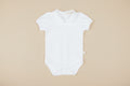 Romper wit of roze - Baby Gi