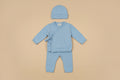 Baby three-piece outfit includes knitted sweater, leggings and hat