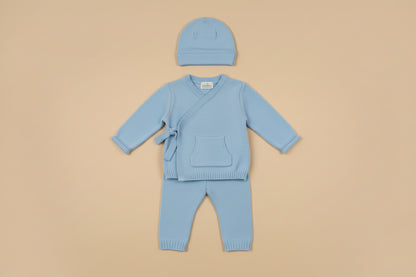 Baby three-piece outfit includes knitted sweater, leggings and hat