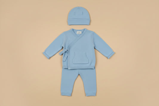 Baby three-piece outfit includes knitted sweater, leggings and hat