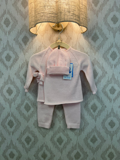 Baby three-piece outfit includes knitted sweater, leggings and hat